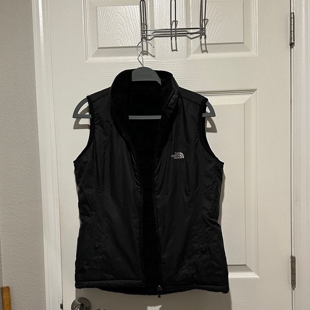 The reversible North Face Women's Black Insulated Vest